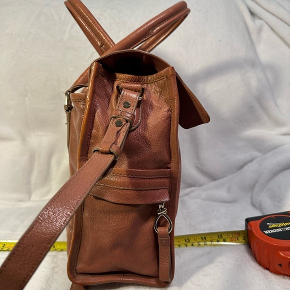 Cole Haan tan satchel with side pockets with zipper